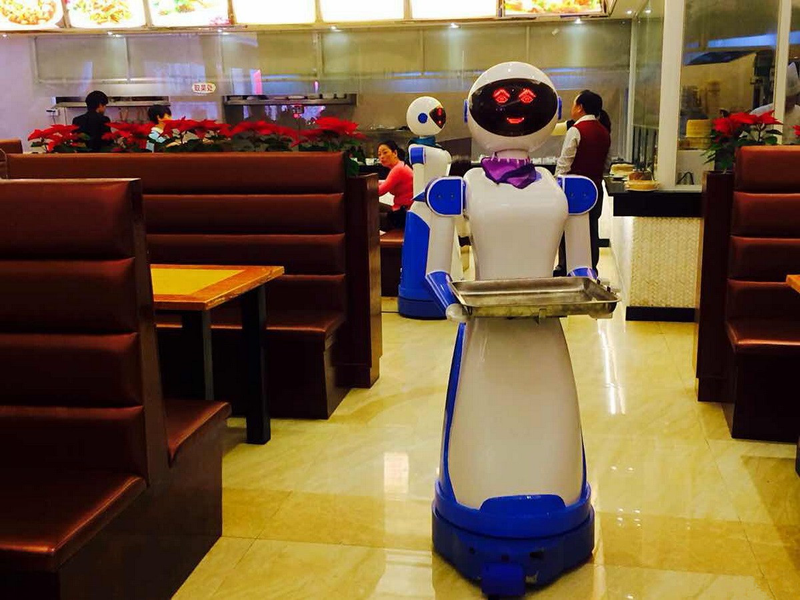 Illustration for article titled The Photographic History Of Robots As Restaurant Employees